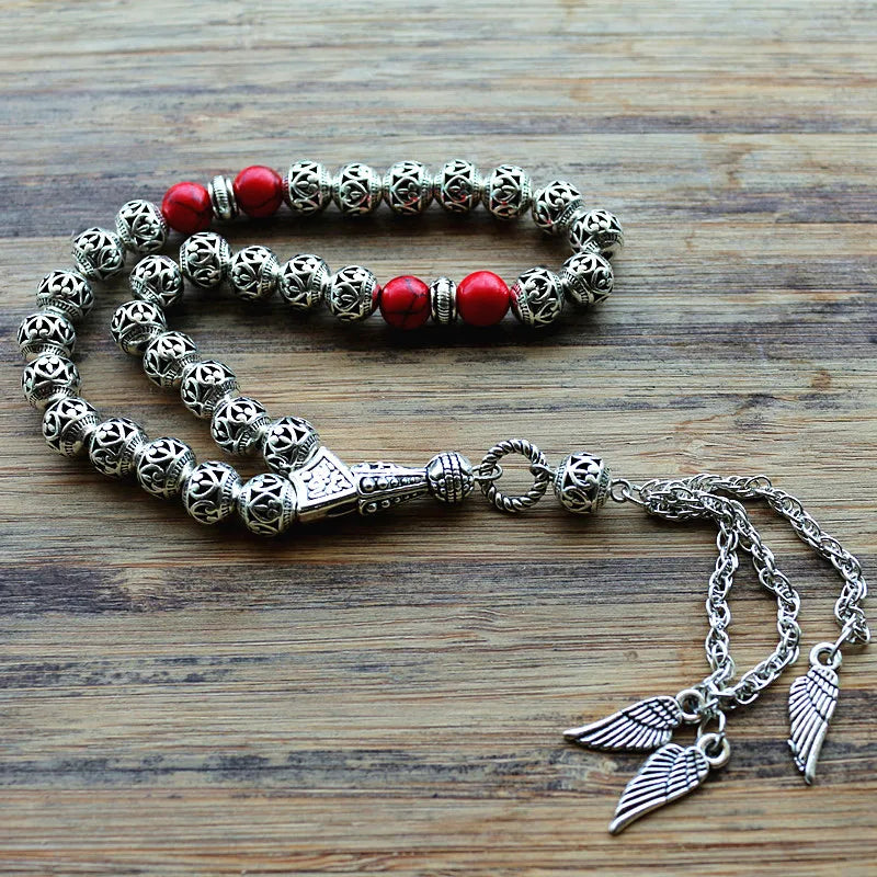Hollow carved alloy Tasbih with Wing detail